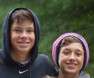 Nick and Henry hanging out at camp
